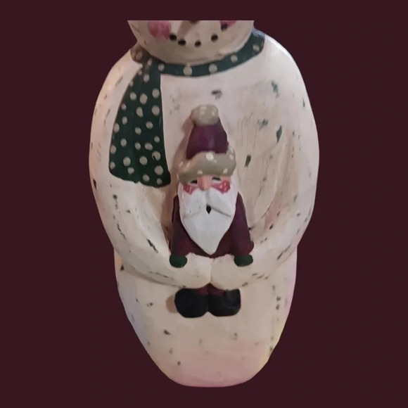 Wood snowman holding santa in his hands - Picture 2 of 6